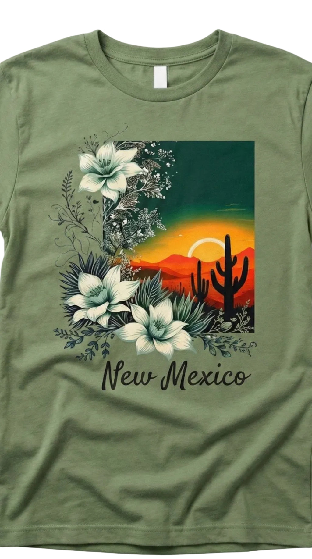 Green t-shirt with New Mexico design featuring cacti and flowers on a white background